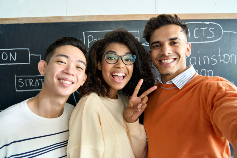 Three Multicultural Young Happy Cheerful Diverse College Student